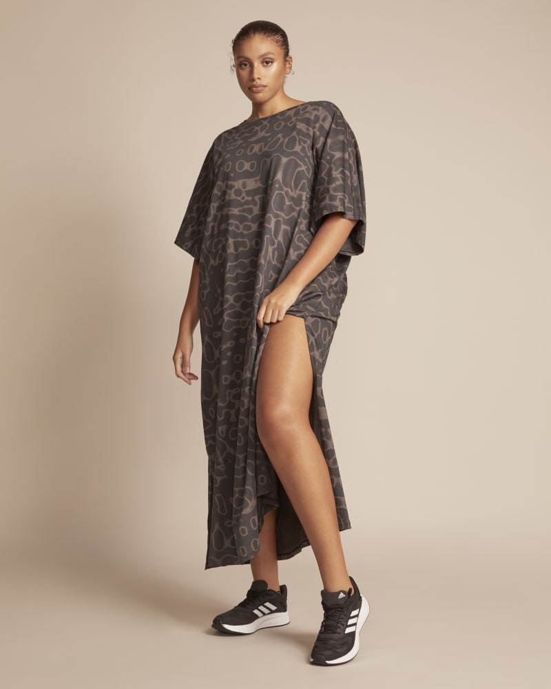 Front of a model wearing a size 1X 11 Honoré x Adidas Kaftan Tee in Black by Adidas x 11 Honoré. | dia_product_style_image_id:245753